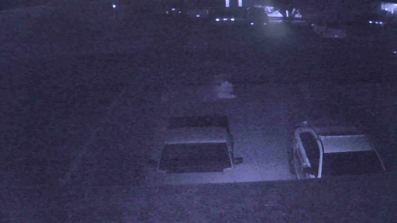 Creepy image caught gliding across surveillance camera